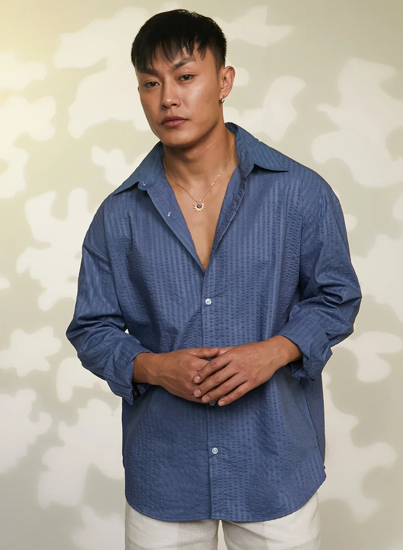 Campus Sutra Campus Sutra Men's Lapis Blue Candy-Textured Shirt For Casual Wear | Spread collor | Long Sleeve | Button Closure | Shirt Crafted With Comfort Fit For Everyday Wear