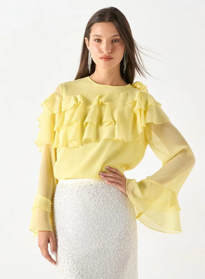 ايكونيك بلوزة بارزة الملمس بأكمام طويلة وتفاصيل كشكش من آيكونيك