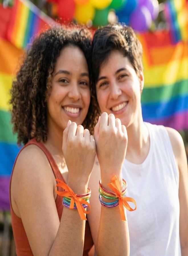 RunNico 10 Pcs Pride Month Jelly Bangles, Rainbow LGBTQ Jelly Bangles with Bowknot, 5 Colors Glitter Filled Bracelets for Pride Themed Party Parades Favors Costume Accessories - Image 4