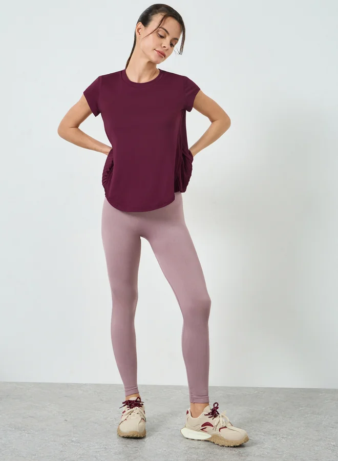 Styli Active Burgundy Pleated Side Curved Hem Short Sleeves Top
