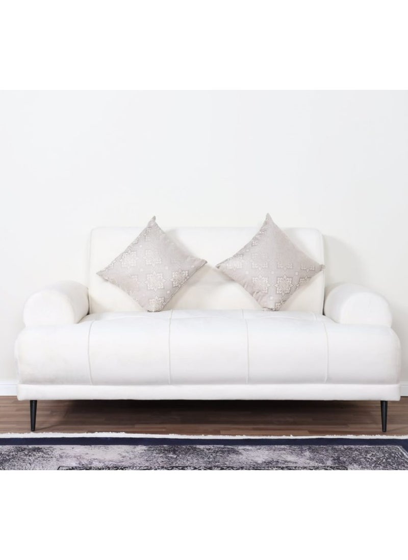 A two-person sofa made of velvet fabric with modern design and steel legs for living room or bedroom