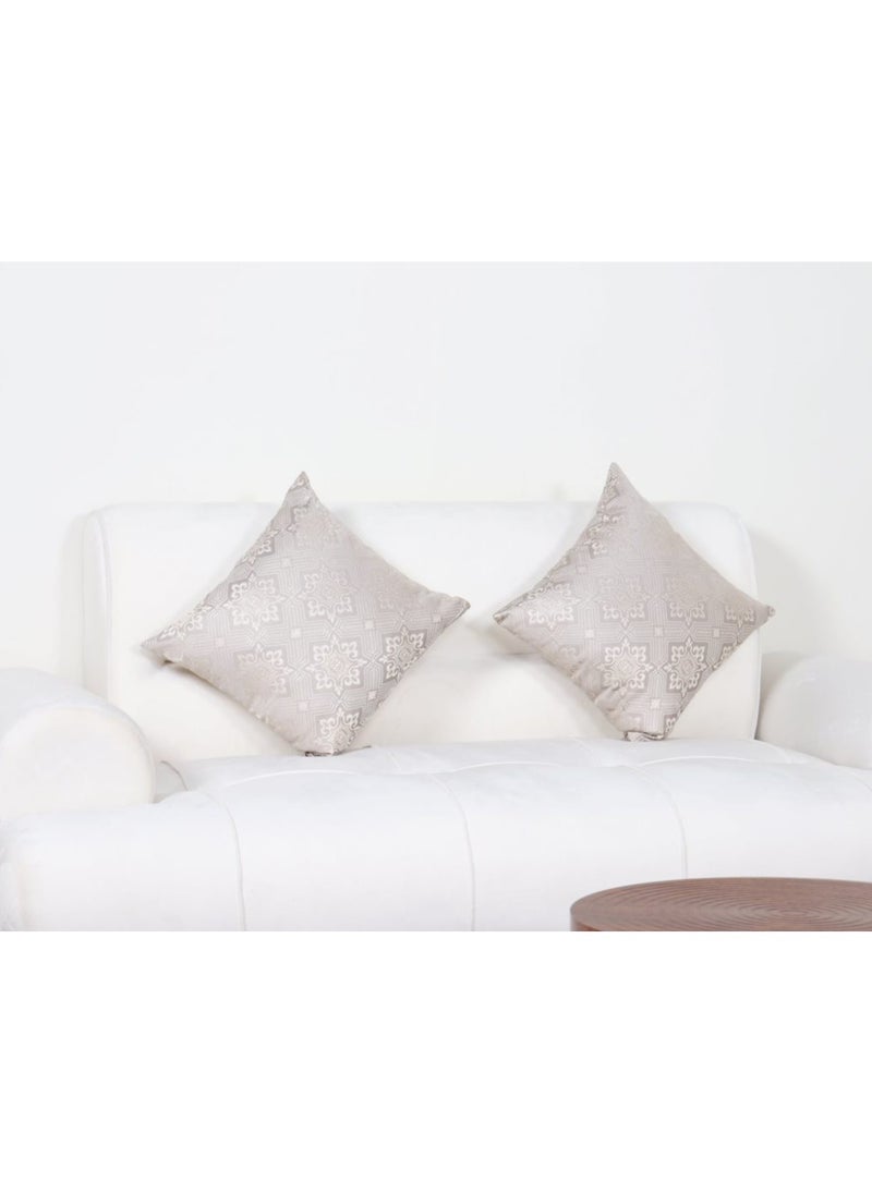 A two-person sofa made of velvet fabric with modern design and steel legs for living room or bedroom