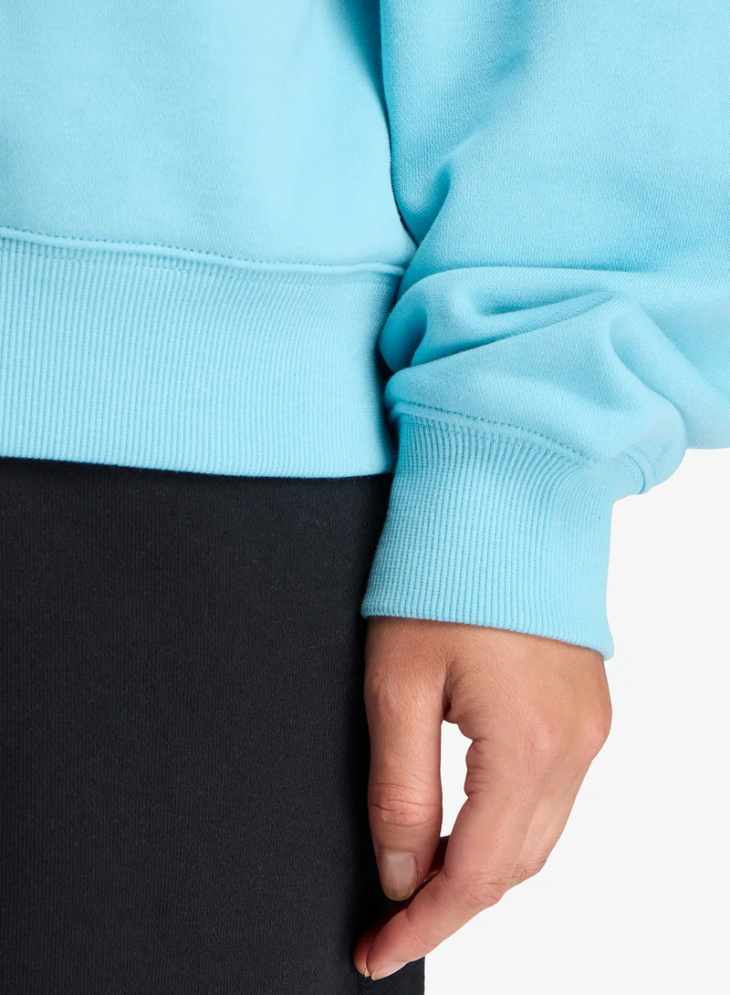 New Balance  Essential French Terry Crew Sweatshirt for Women | Best Price UAE