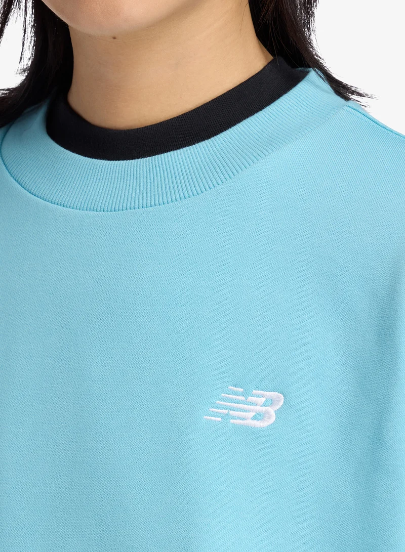 New Balance  Essential French Terry Crew Sweatshirt for Women | Best Price UAE