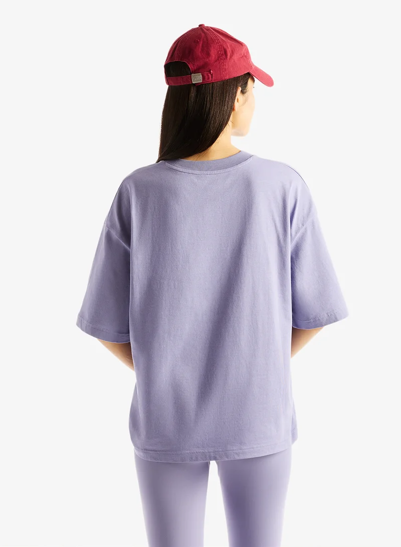 New Balance DARK SMOKED VIOLET (DSV) Trackside Oversized T-Shirt for Women | Best Price UAE