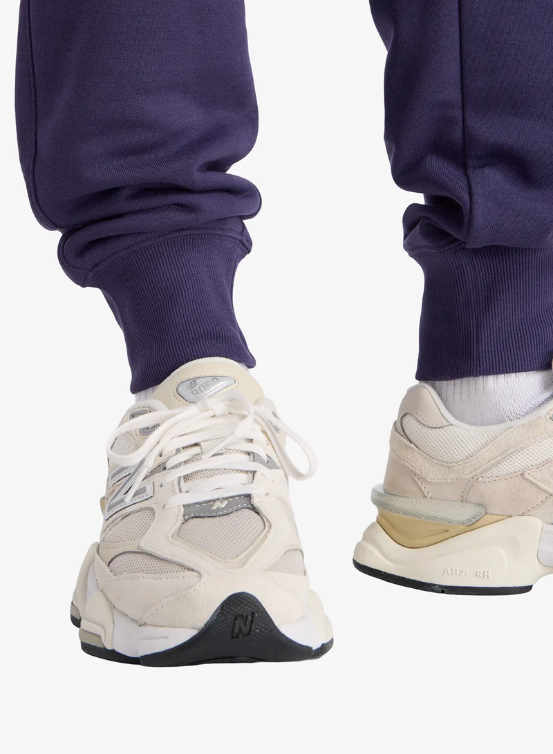 New Balance  French Terry Graphic Joggers for Women | Best Price UAE