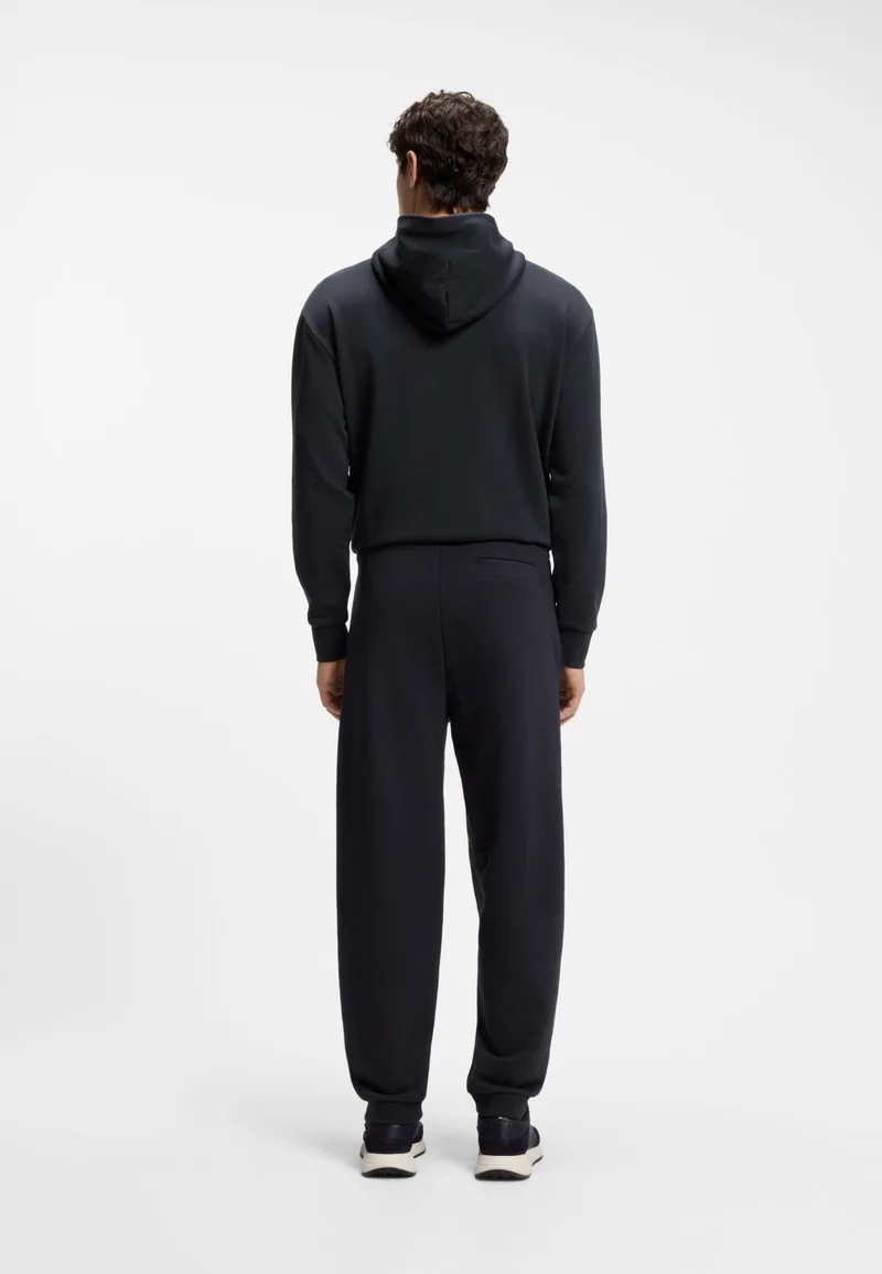 BOSS Dark Blue Relaxed-fit trousers in innovative French Terry for Men | Best Price UAE
