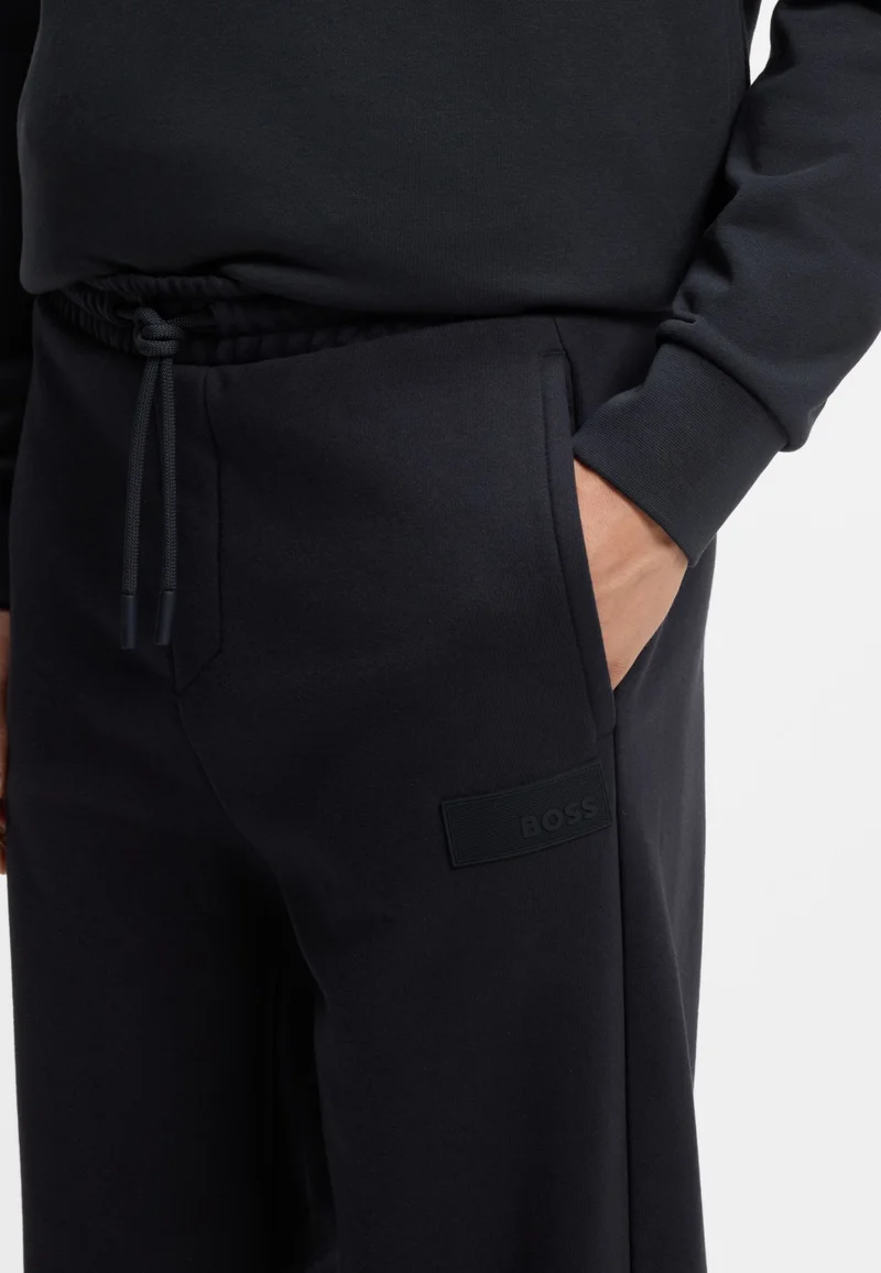 BOSS Dark Blue Relaxed-fit trousers in innovative French Terry for Men | Best Price UAE