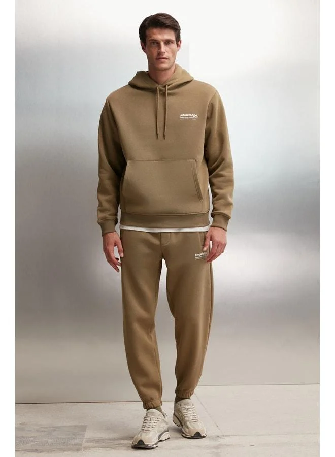 GRIMELANGE Bernon Men's Ultra-Soft Elastic Narrow-Leg Three-Pocket Organic Cotton Khaki Tracksuit Bottom.