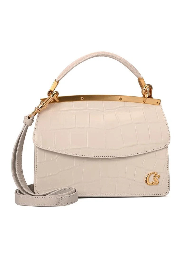 كارمن ستيفنز حقيبة جلدية قابلة للعكس باللون الأبيض بيانكو