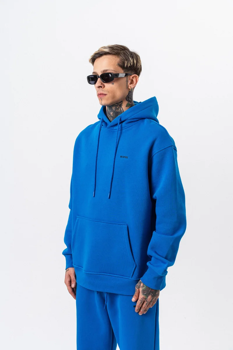 ريسباير هودي رجالي واسع بطبعة حرفية أزرق