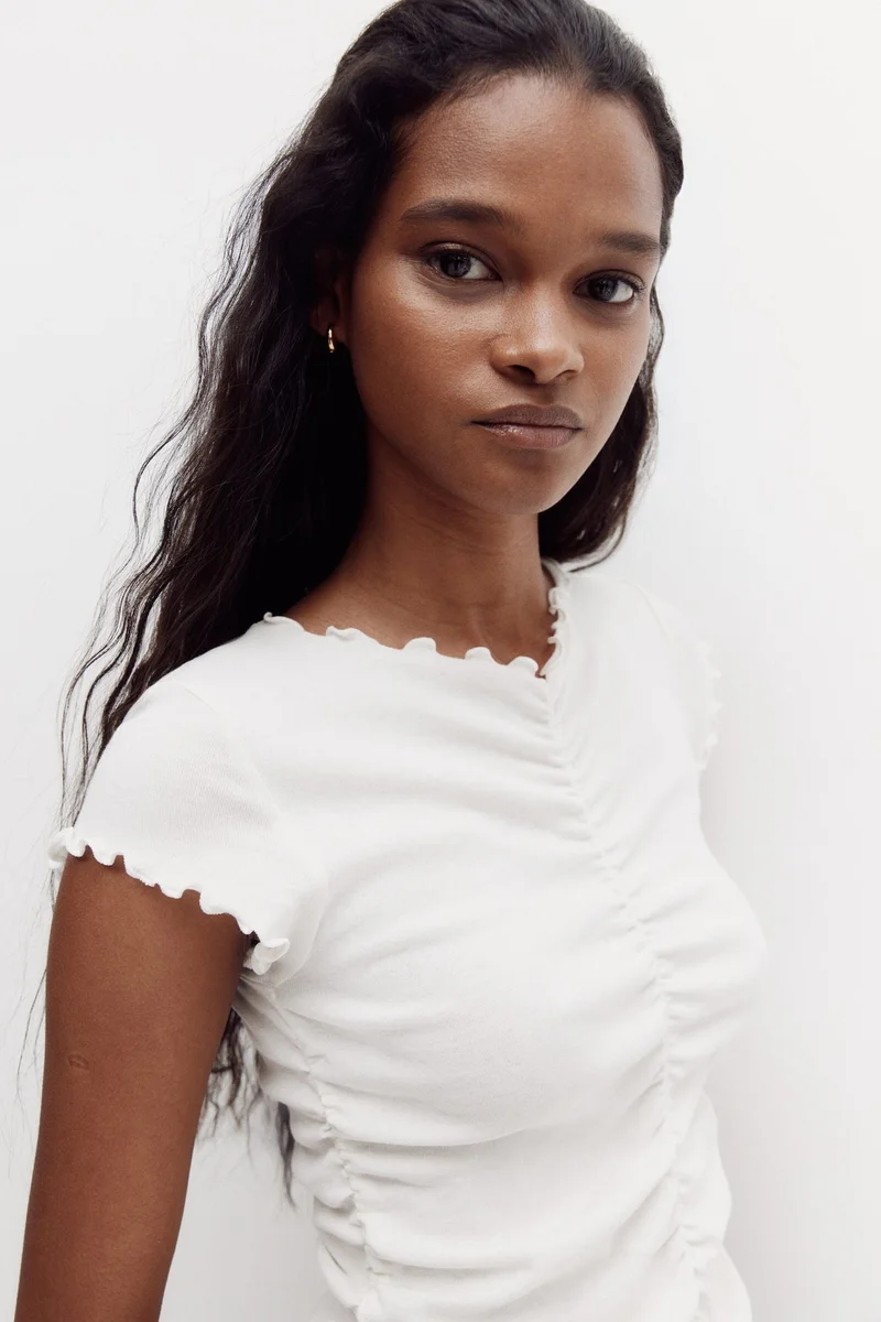 اتش اند ام بلوزة من القطن بقصة منسدلة