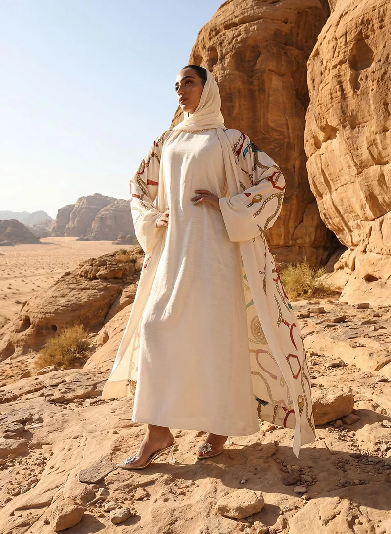 آي شين عباية طويلة مطبوعة منسوجة بلون أوف وايت مع حجاب