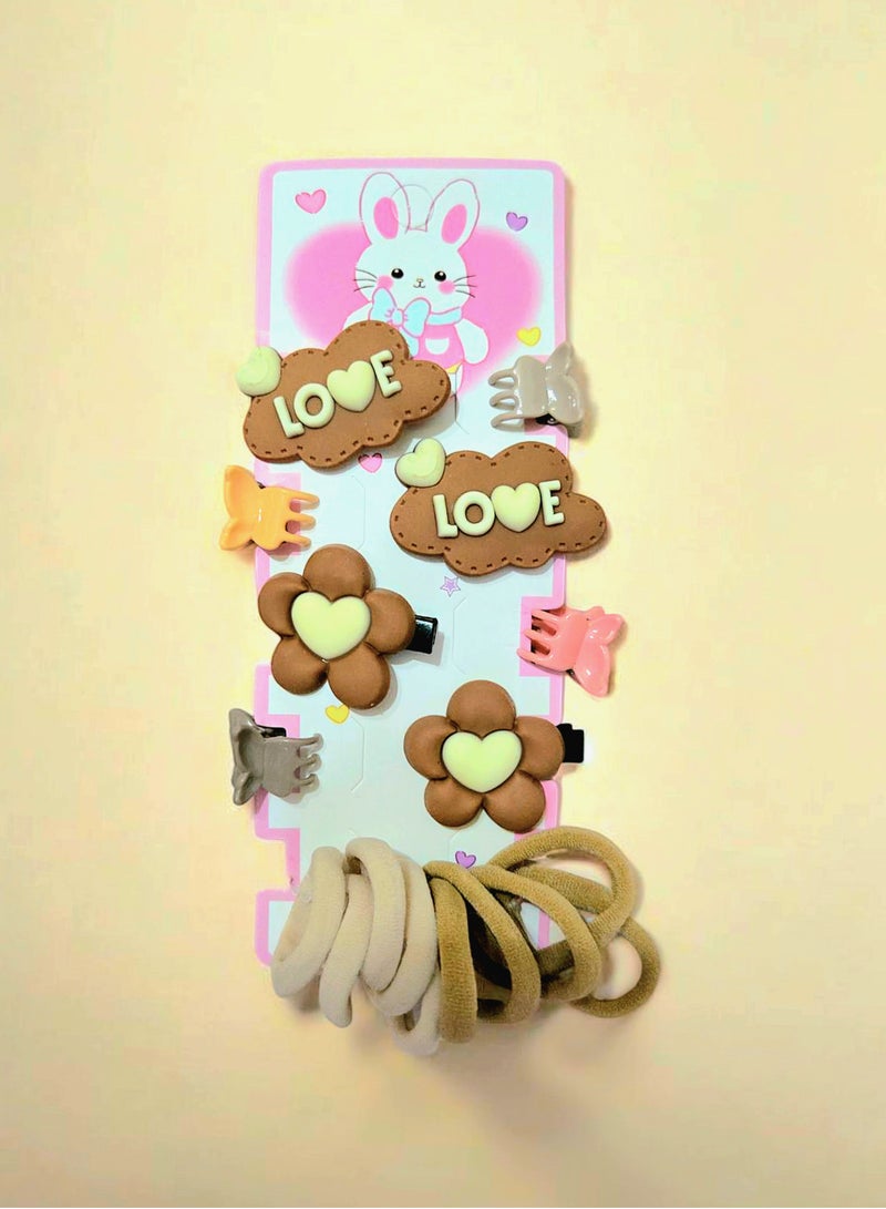 طقم إكسسوارات شعر يضم مشابك شعر و ربطات شعر مطاطية - Image 1