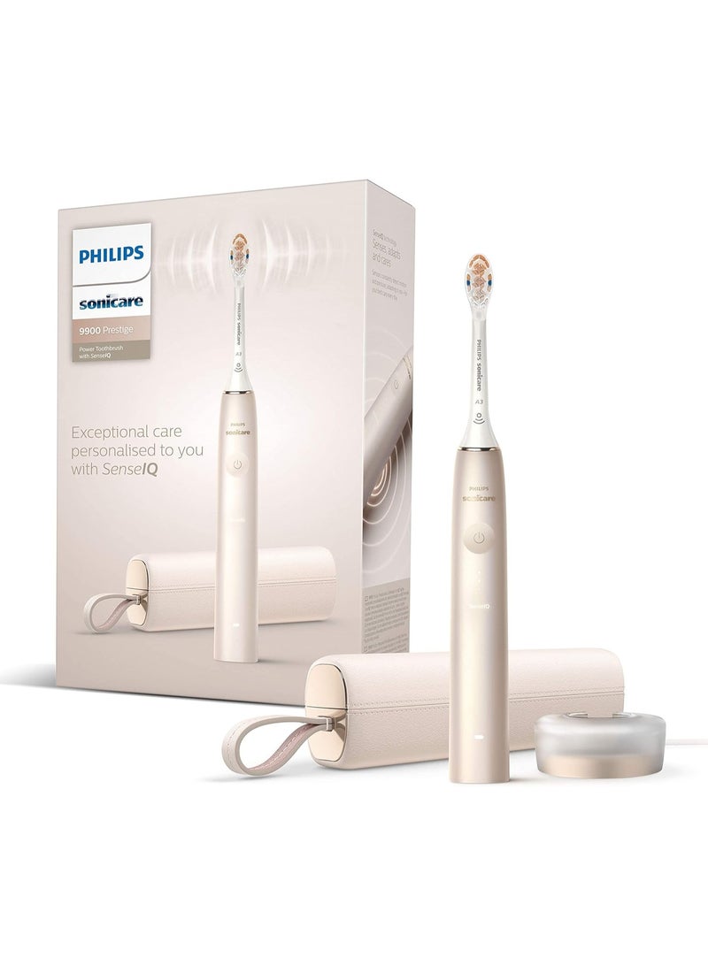 فيليبس سونيكير فرشاة أسنان فيليبس سونيكير الكهربائية Philips Sonicare 9900 Prestige مع تقنية SenseIQ، تتكيف وتعتني بالأسنان، تطبيق سونيكير المدعوم بالذكاء الاصطناعي، حقيبة سفر وقاعدة شحن، لون شامبين ذهبي فاتح، HX9992/11 - Image 1
