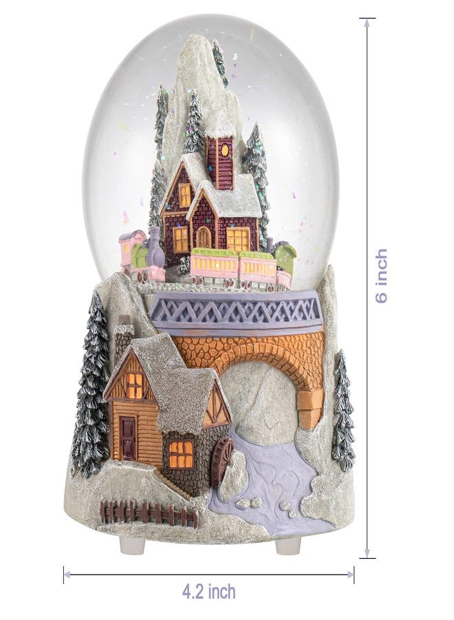 Juniland Castle Snowy House and Revolving Train Snow Globe Color Changing Lighting Snowglobe Plays Winter Wonderland (Castle and Train) - Image 2
