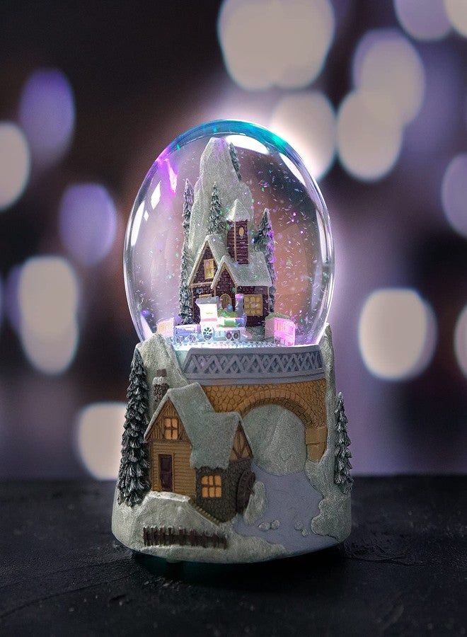 Juniland Castle Snowy House and Revolving Train Snow Globe Color Changing Lighting Snowglobe Plays Winter Wonderland (Castle and Train) - Image 4