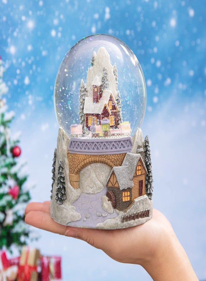 Juniland Castle Snowy House and Revolving Train Snow Globe Color Changing Lighting Snowglobe Plays Winter Wonderland (Castle and Train) - Image 5