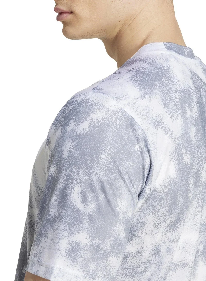 Adidas HALSIL Train Essentials Seasonal All Over Print Tee for Men | Best Price UAE