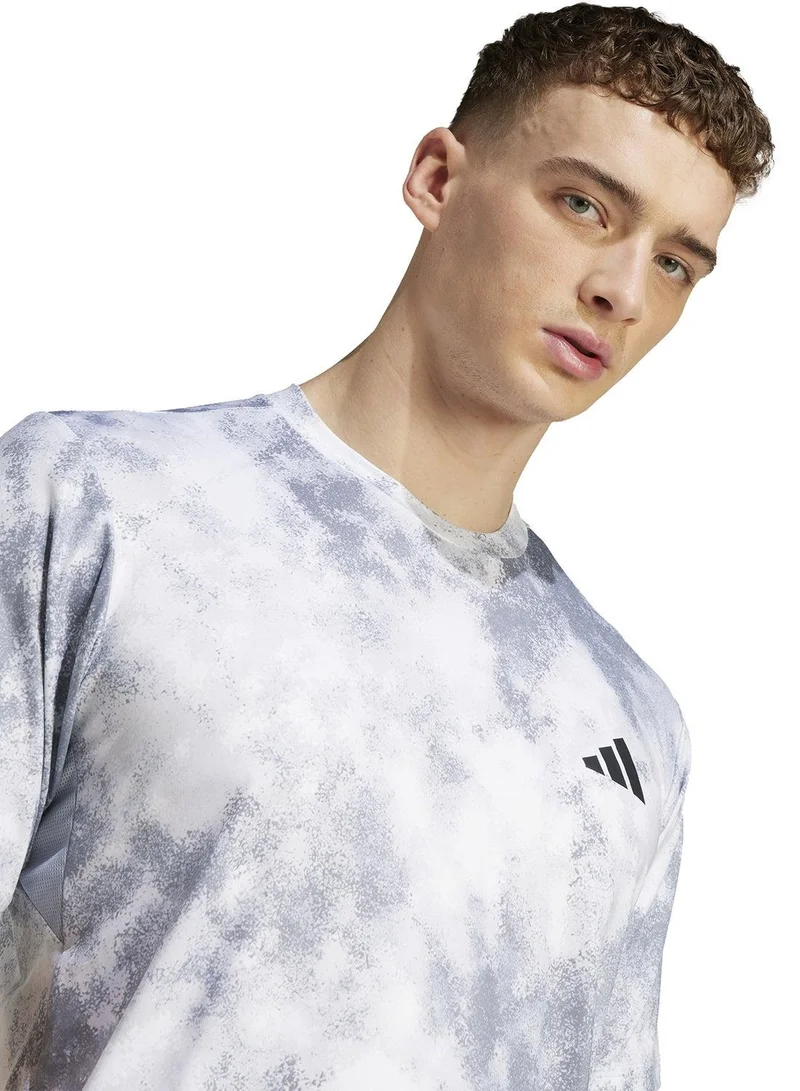 Adidas HALSIL Train Essentials Seasonal All Over Print Tee for Men | Best Price UAE