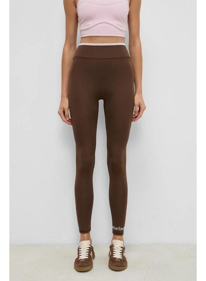 Urban Beat  VELTREN Women's Stretchy and Soft-Textured Contrast-Piped Dark Brown Leggings for Women | Best Price UAE