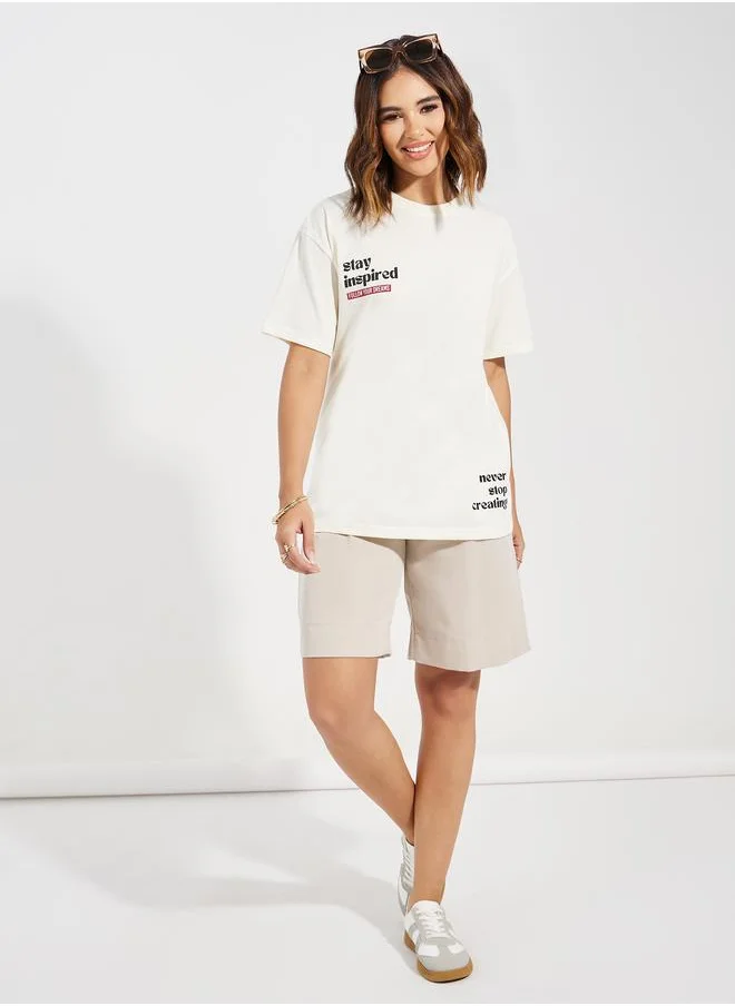 ستايلي Oversized Stay Inspired Slogan Dropped Shoulder T-Shirt