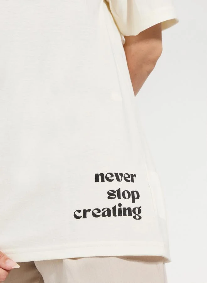 Styli Oversized Stay Inspired Slogan Dropped Shoulder T-Shirt