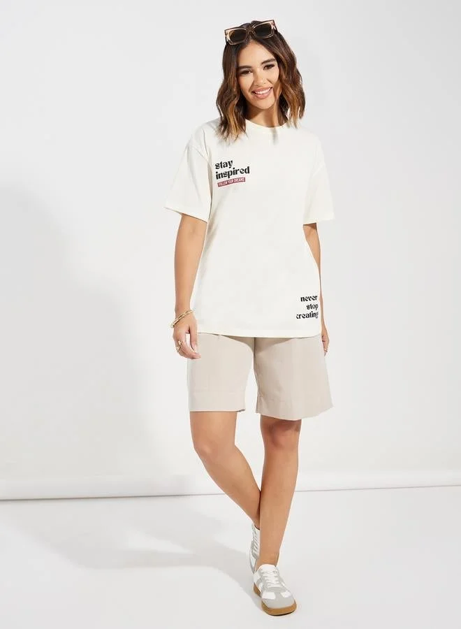 Styli Styli Oversized Stay Inspired Slogan Dropped Shoulder T-Shirt