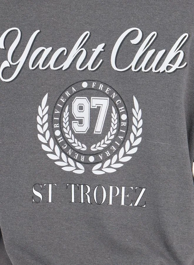 Styli Oversized Varsity Print Dropped Shoulder T-Shirt