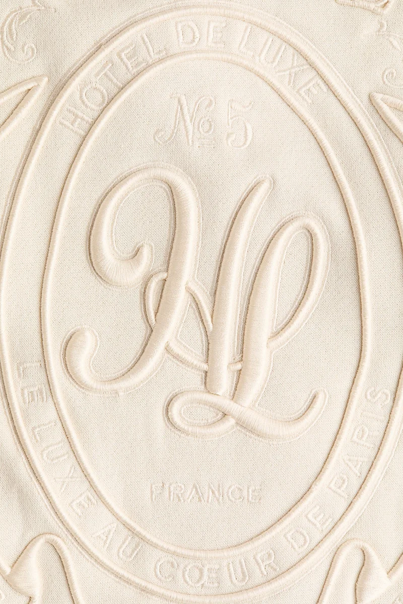 اتش اند ام سويت شيرت بتفاصيل مزخرفة