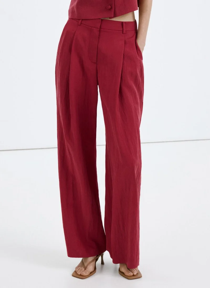 MANGO Mid-rise lyocell pants