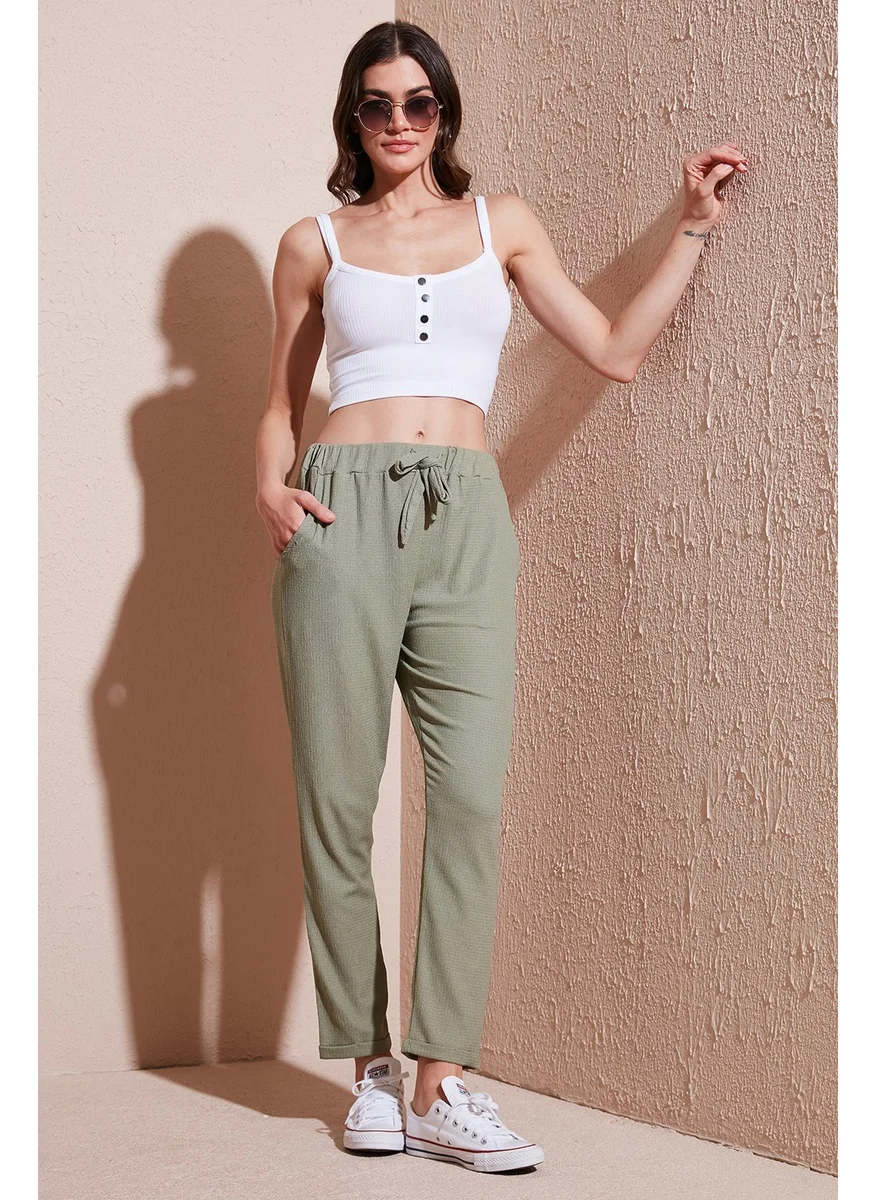 Lela Waist-Tie Pocketed Short-Leg Slim-Fit Trousers Women's Trousers 5869017