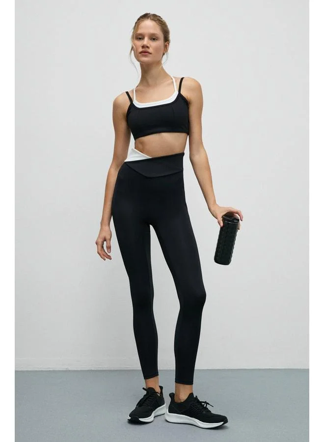 Urban Beat  JULSEN Women’s Soft and Stretchy Textured Leggings with Asymmetric Contrast Waist Detail in Black and White for Women | Best Price UAE