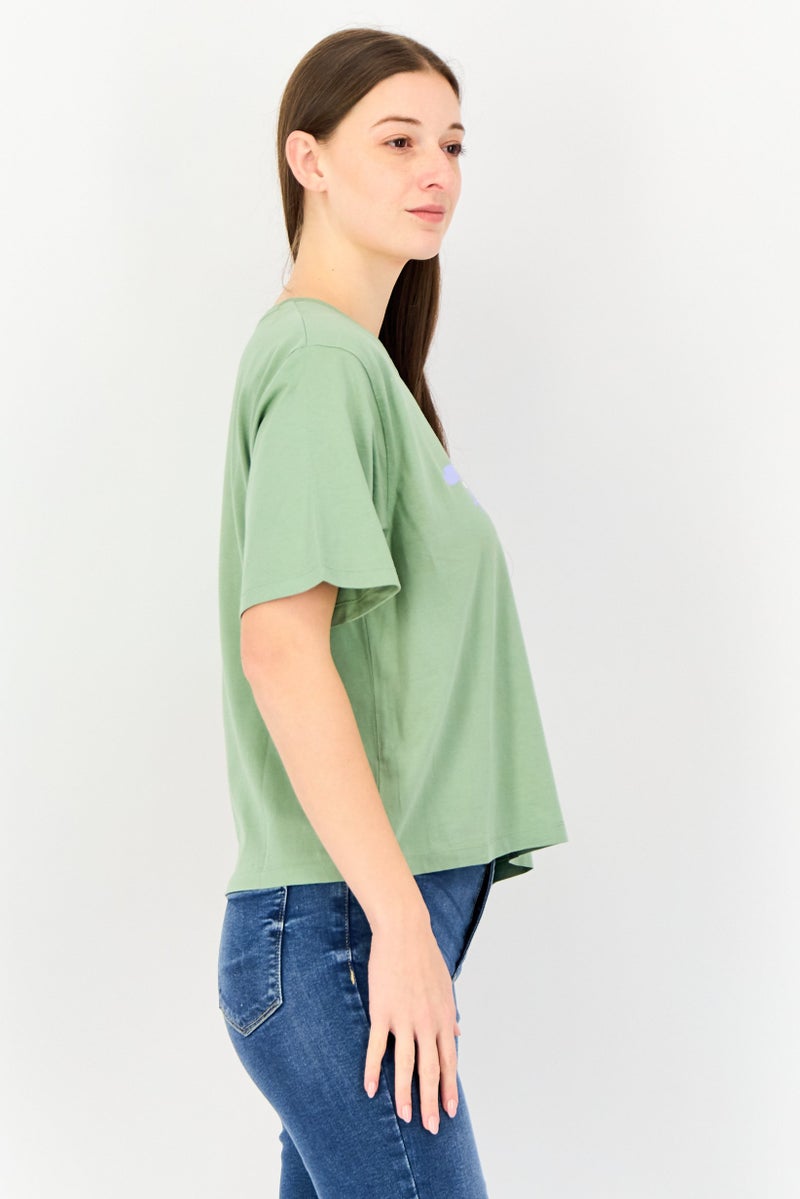 Levi's تي شيرتات جرافيك قصيرة الأكمام من ليفيس × ديبيكا بادوكون للنساء، أخضر - Image 3