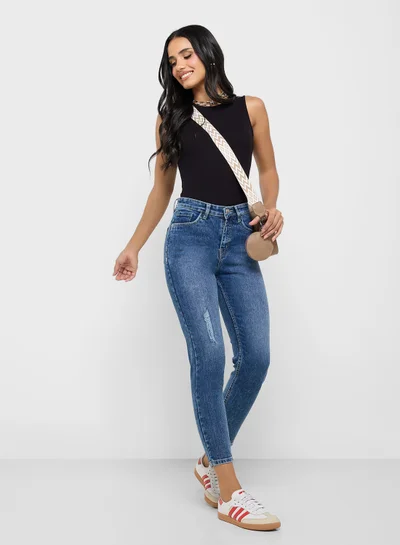 Ginger Distressed Mid Rise Skinny Jeans