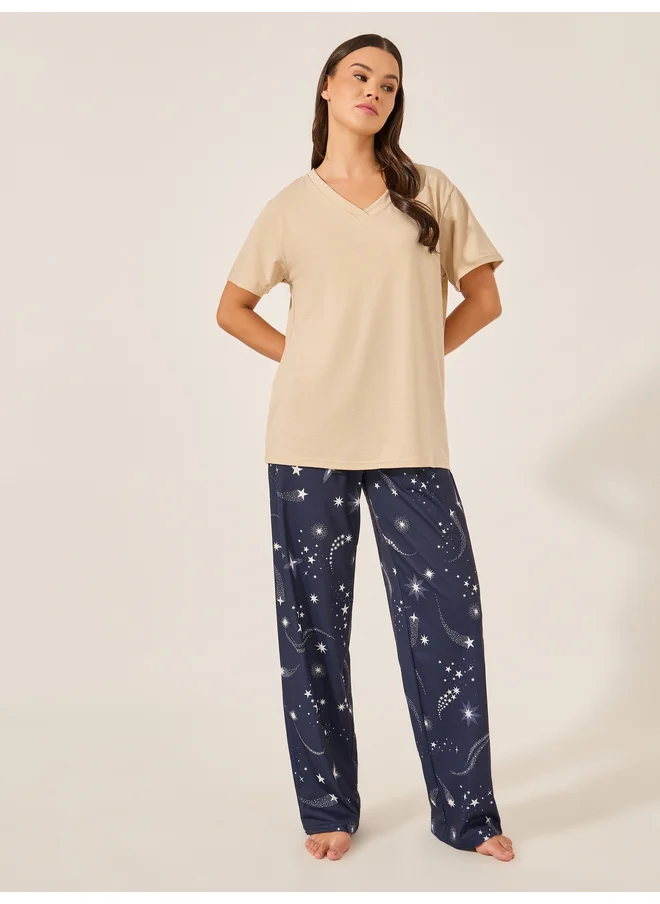 Styli Styli Unwind V-Neck Texture Tee and AOP Star PJ Set