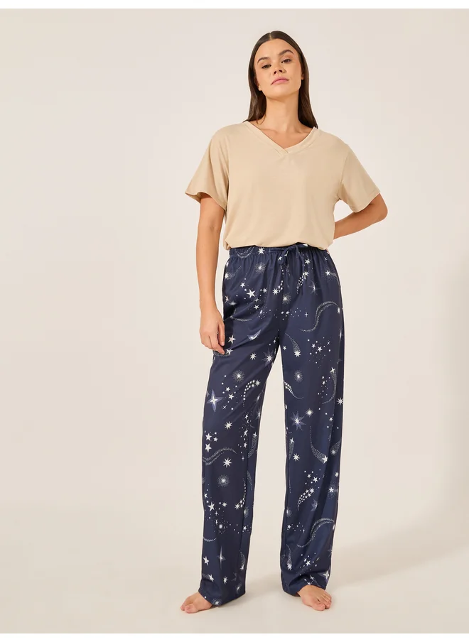 Styli Styli Unwind V-Neck Texture Tee and AOP Star PJ Set