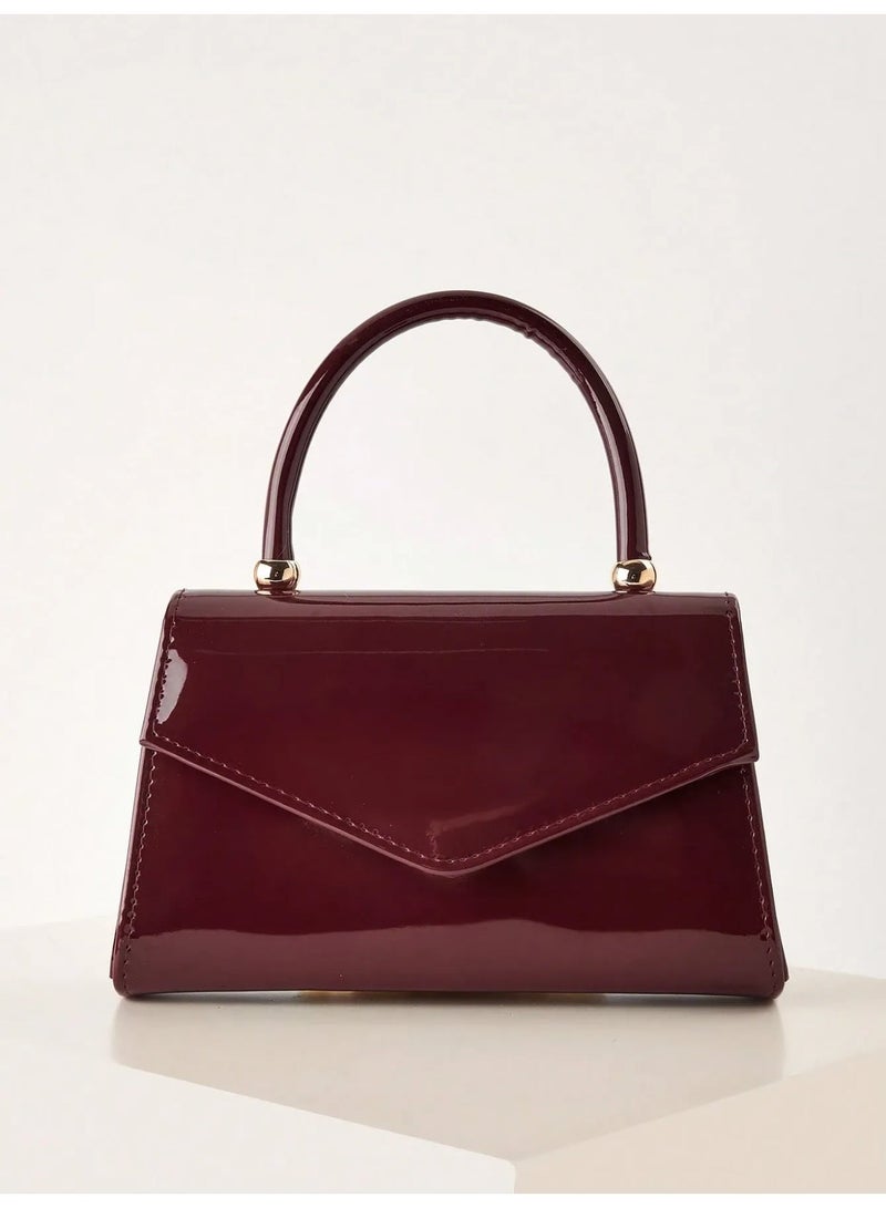 Elegant Women’s Burgundy Handbag with Glossy Finish and Luxurious Handle – Sophisticated Evening Clutch Perfect for Weddings, Engagements, Eid, and Special Occasions - Image 1