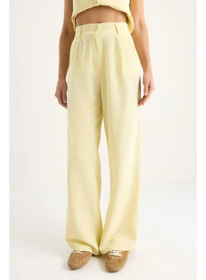 جينجر طقم بنطلون وسترة فضفاضة بأزرار