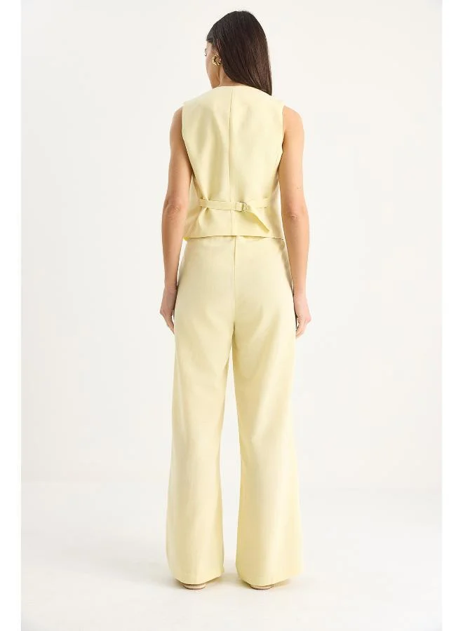 جينجر طقم بنطلون وسترة فضفاضة بأزرار