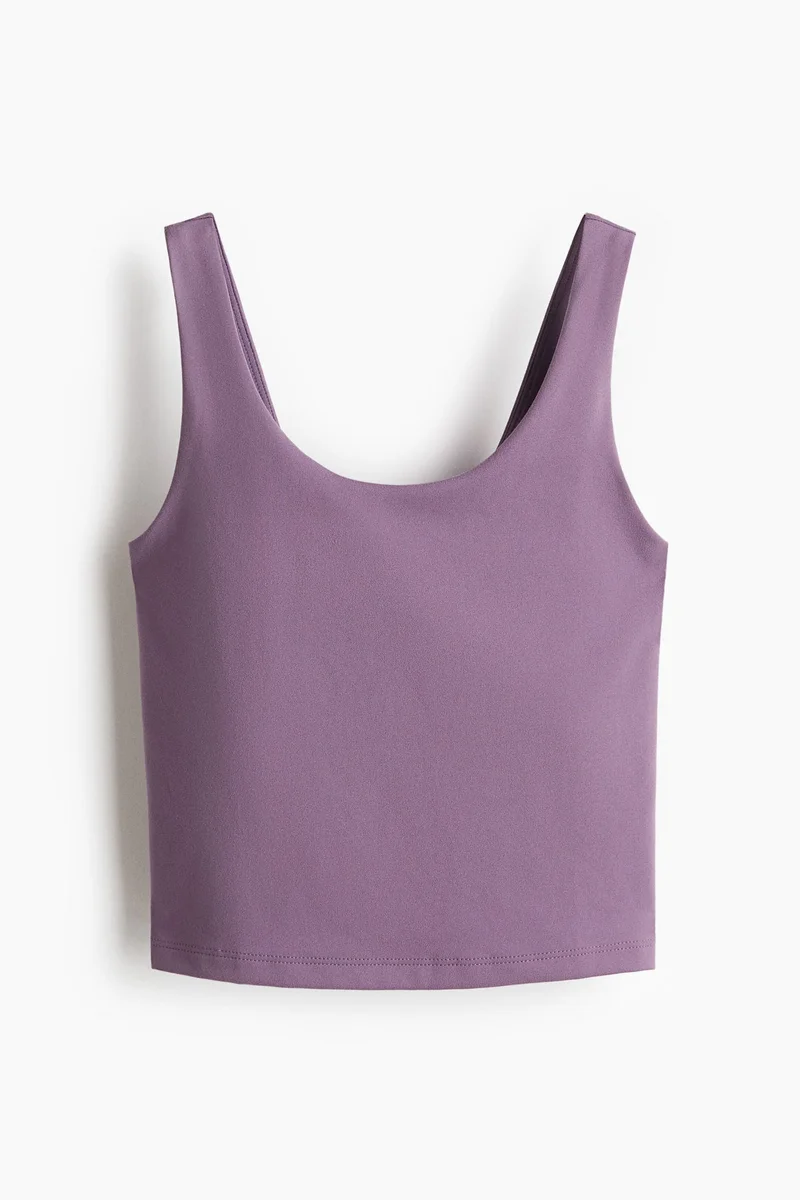 اتش اند ام بلوزة رياضية بحمالة صدر مدمجة من نسيج سوف موف