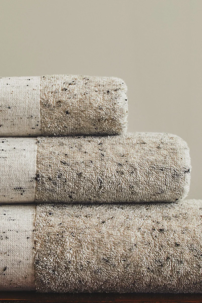 H&M Cotton hand towel with neps