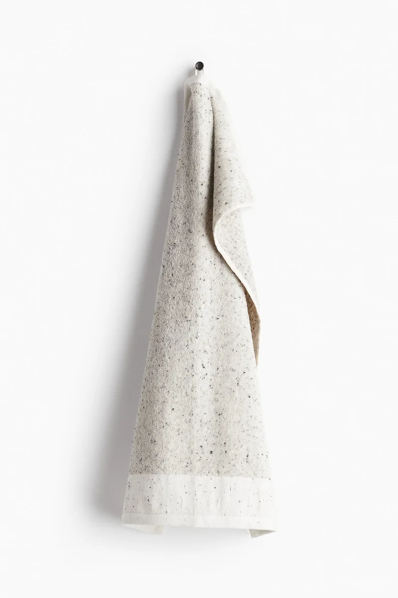 H&M Cotton hand towel with neps
