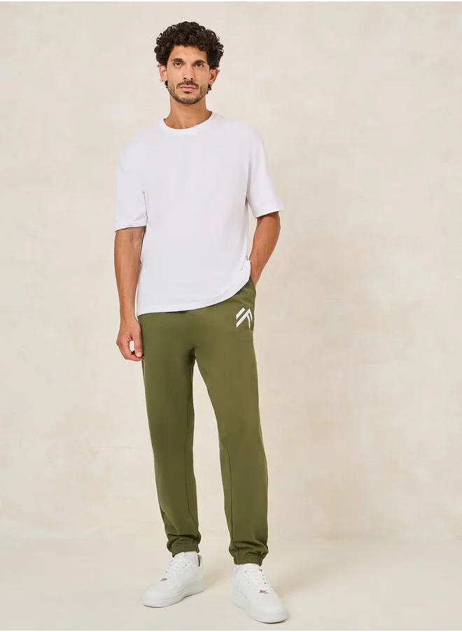 ستايلي Minimal Print Oversized Joggers with Elasticated Hem