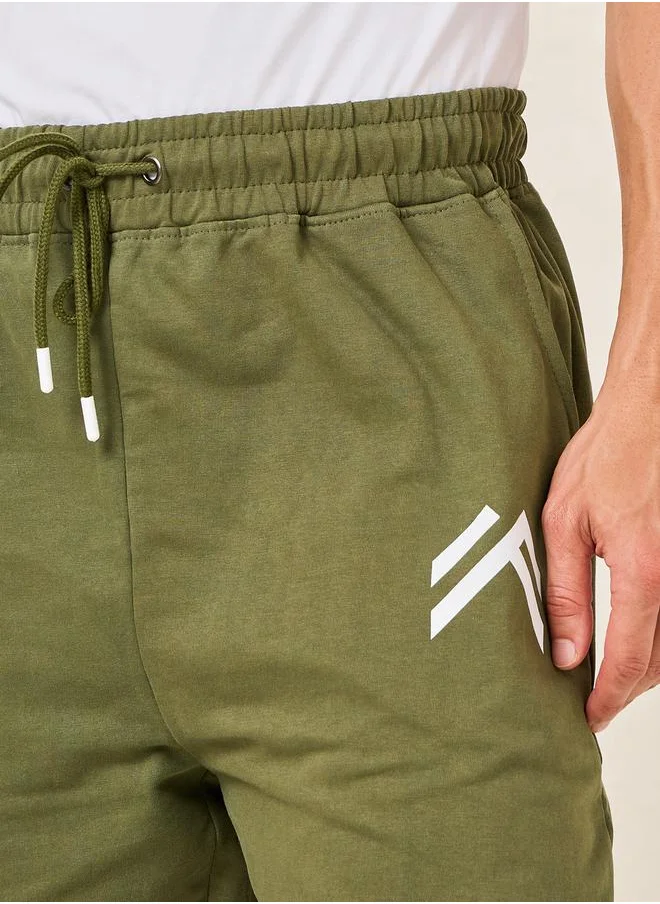ستايلي Minimal Print Oversized Joggers with Elasticated Hem