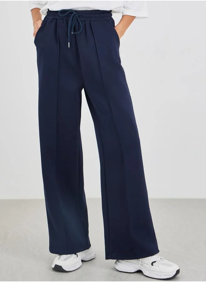 ستايلي Styli Solid Pintuck Detail Scuba Joggers with Elasticated Waistband