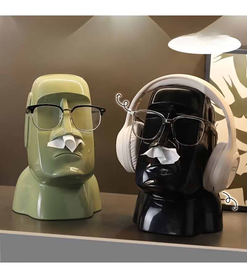 مناديل ورق بيضاء على شكل تماثيل مواي مع حامل للأنف بتصميم أنيق، منظم للمكتب. - Image 1
