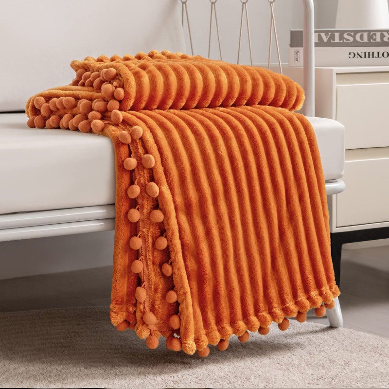 DISSA Fleece Blanket Twin Size  60x80 Orange  Soft Plush Fluffy Fuzzy Warm Cozy  Perfect Throw for Couch Bed Sofa  with Pompom Fringe  Flannel Blanket Throw Blanket