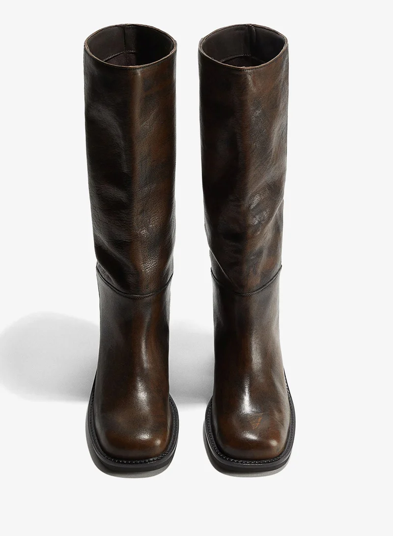 اتش اند ام بووت من الجلد