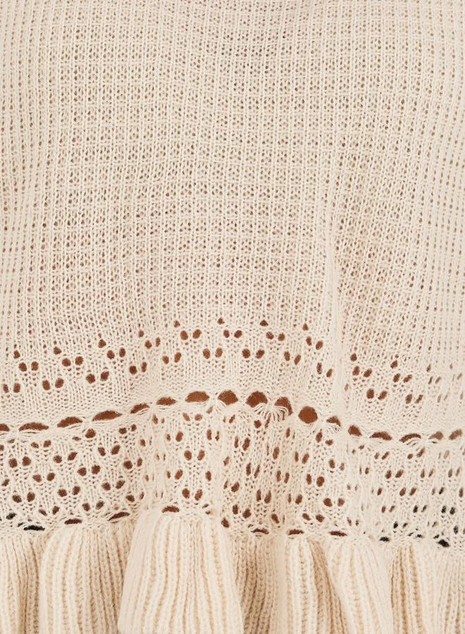 Styli Knitted Ruffled Hem Round Neck Top